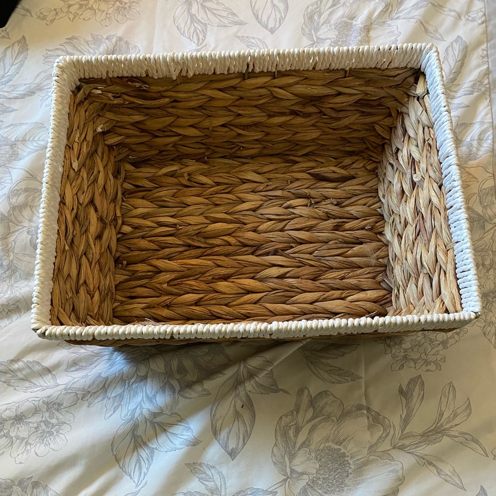 Woven basket with white trim
